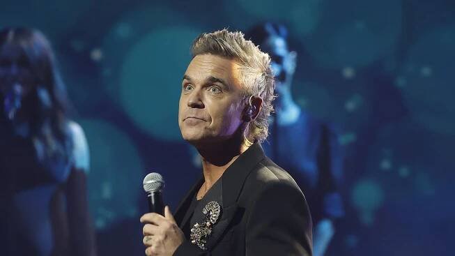 Emotional Robbie Williams shares heartbreaking update on mums dementia