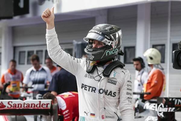 F1 - Rosberg claims dramatic pole position in rain-hit qualifying in Hungary