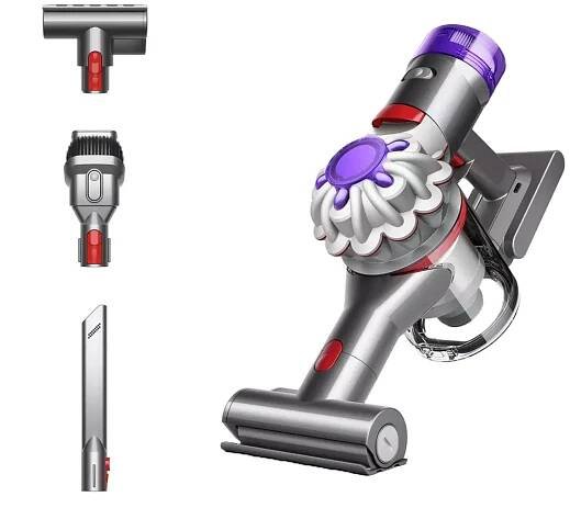 Dyson Car + Boat Handheld Vacuum Cleaner with accessories next to it