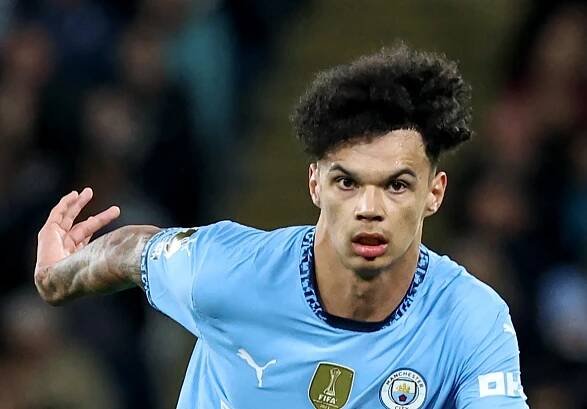 Manchester City's Nico O'Reilly playing soccer.