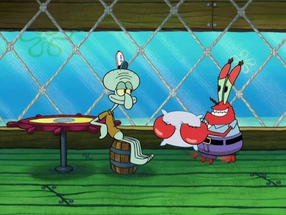 Squidward sits on a barrel at a table while Mr. Krabs stands holding a pillow in a cartoon restaurant setting from "SpongeBob SquarePants."