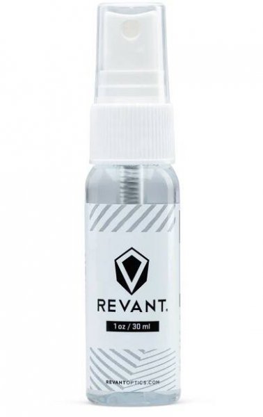 A bottle of Revant Lens Cleaner against a white backdrop.