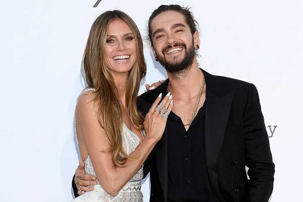 Heidi Klum Goes Topless in Beach Snap as She Shares a Loving Kiss with Husband Tom Kaulitz