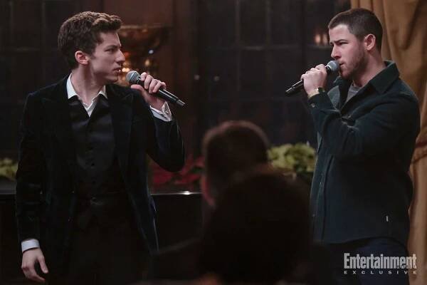 Andrew Barth Feldman and Nick Jonas in A Very Jonas Christmas