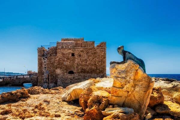 Paphos Castle with a sculpture on Cyprus Island.