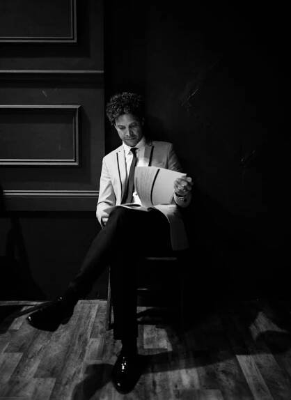 Contact 2 — Justin Guarini