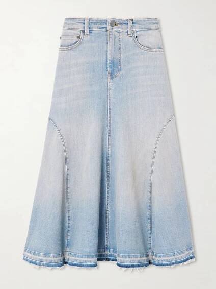 A blue denim midi skirt with frayed panel design by Ganni