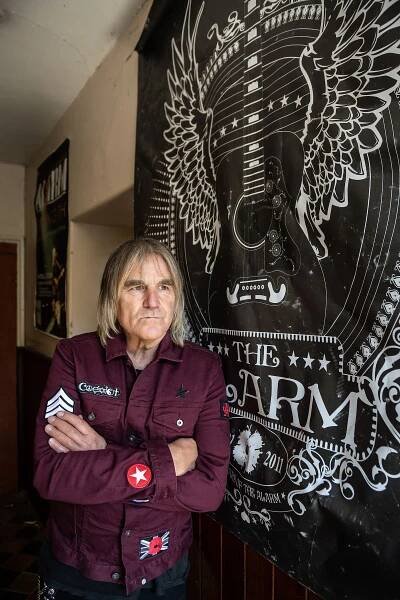 RHYL, UNITED KINGDOM - APRIL 18: Portrait of Welsh musician Mike Peters, guitarist and vocalist with rock group The Alarm, taken on April 5, 2018.