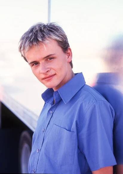 Portrait of Jon Lee, a British pop singer and actor.