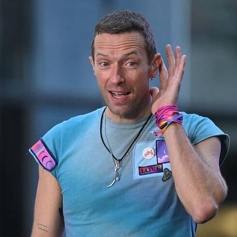Chris Martin hilariously asks couple if they're 