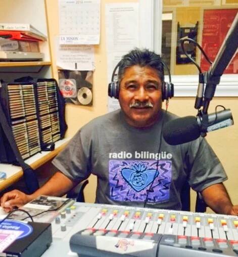 Mario Gómez, a Radio Bilingüe volunteer who operates the board during the La Hora Mixteca program. (Photo: Radio Bilingüe)