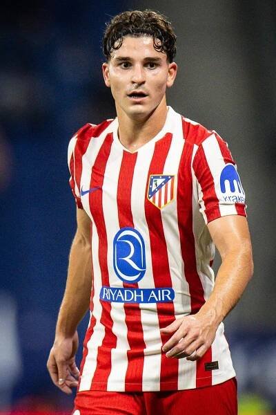 Julian Alvarez of Atlético Madrid in a soccer jersey.
