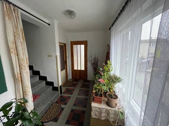 Prodej RD s garáží a zahradou v Chocni.