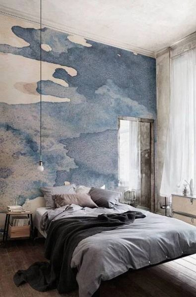 an image of a bedroom with a map on the wall