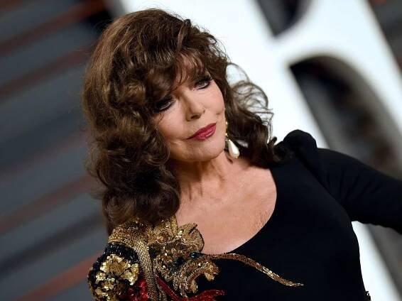 Joan Collins, 91, shows off sky-high legs in glamorous beachwear
