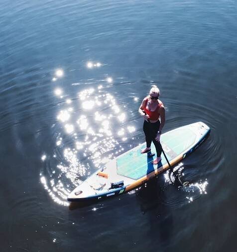 Explore Magazine paddleboarding water surf  Explore Magazine