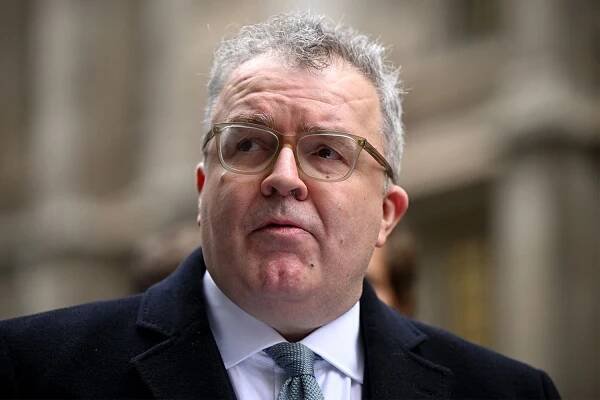 Former Labour deputy leader Lord Tom Watson speaks to the media outside the High Court on January 22, 2025 in London, England.