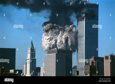 WTC (world trade center) 2 collapsing as WTC 1 still stands behind it in NYC on September 11th, 2001. Stock Photo