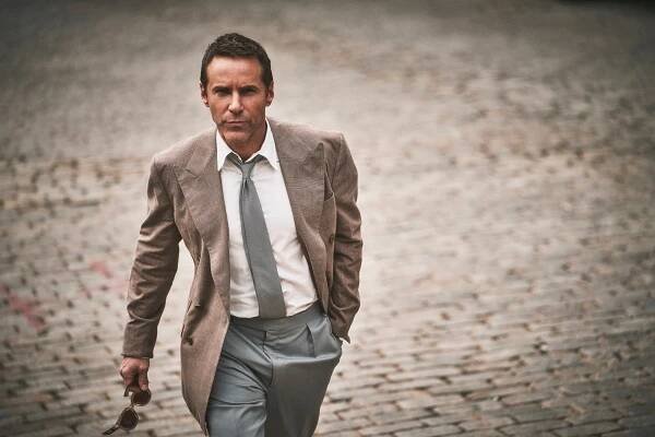 Jacket, shirt, tie, pants and shoes by RALPHLAUREN PURPLE LABEL; sunglasses by JACQUES MARIE MAGE.