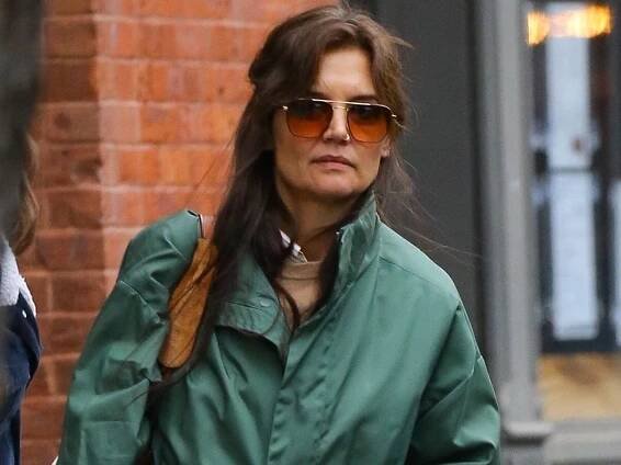 Suri Cruise, 17, pictured with beautiful long hair as she heads off for last vacation with mom Katie Holmes before her 18th birthday