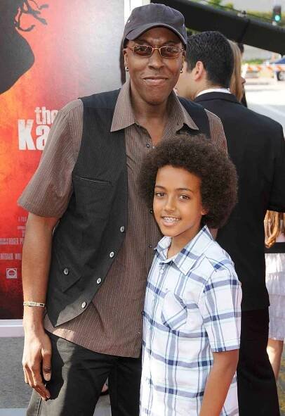 Arsenio Hall and son arrive at the Los Angles Premiere of "The Karate Kid" on June 7, 2010 in Westwood, California.