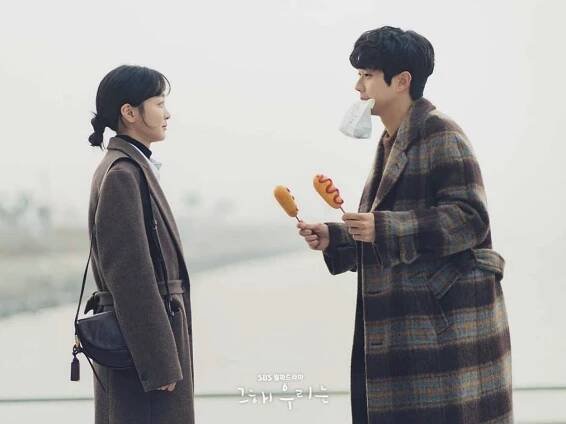 Korean Actor Choi Woo Shik Enjoying a Corndog Date Wallpaper