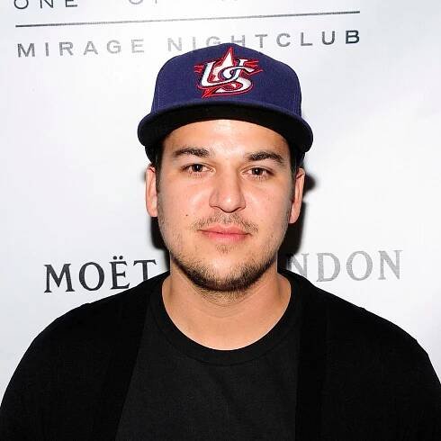 How Rob Kardashian's behavior as dad to daughter Dream, 8, differs from famous sisters