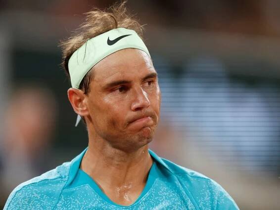 French Open day two: Rafael Nadal makes early exit but Iga Swiatek progresses
