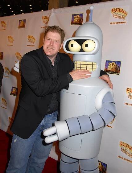  Actor John DiMaggio (voice of Bender) with Bender character attends the Futurama Bender's Big Score Premiere held at the Arclight Cinemas on November 15, 2007 in Hollywood, California.