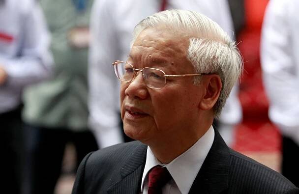 Vietnam's General Secretary of the Communist Party and National Assembly Chairman Nguyen Phu Trong talks to media after he casts his vote for members of the 14th National Assembly and People's Councils at a polling station in Hanoi