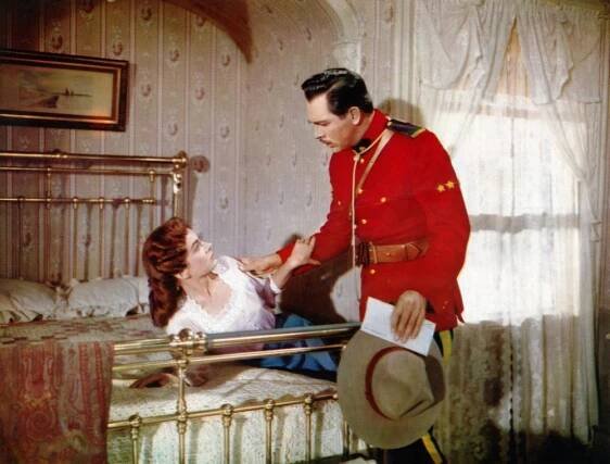 ROSE MARIE, from left, Ann Blyth, Howard Keel, 1954