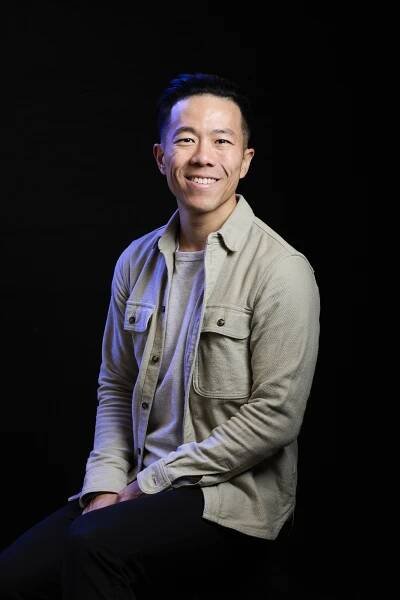 Photo of Kevin Wong giving a talk about design systems