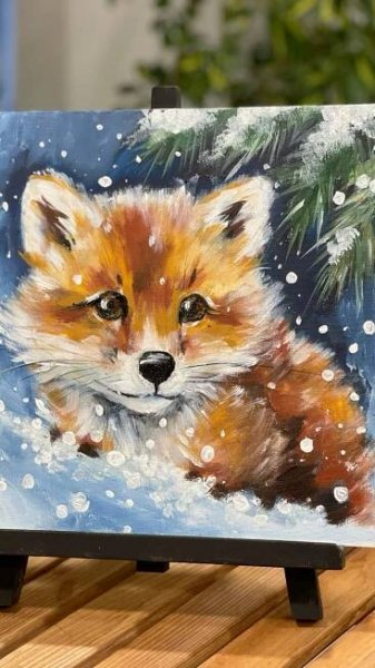 a painting of a red fox sitting in the snow with pine trees on it's side