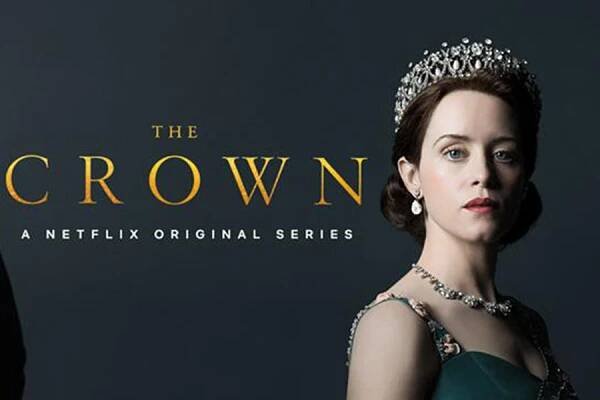 Advert for the Crown on Netflix showing actor of Queen Elizabeth II wearing crown on dark blue background. 