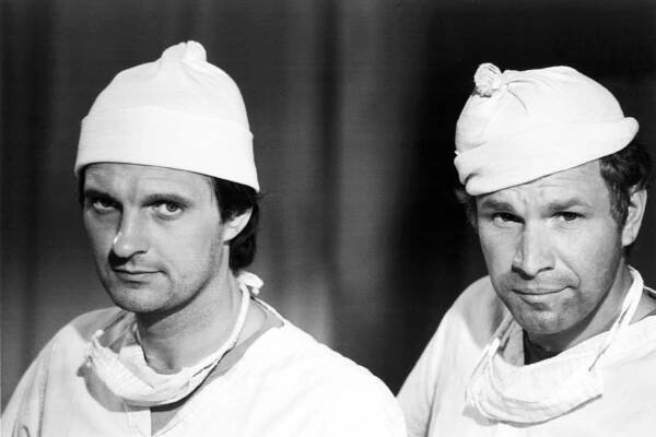 MASH, (aka M*A*S*H*), from left: Alan Alda, Wayne Rogers