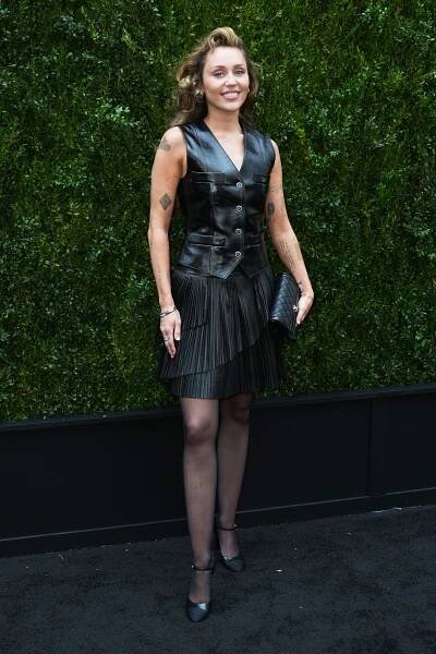 Miley Cyrus at the Chanel and Tribeca luncheon to celebrate Through Her Lens: The Tribeca Chanel Women's Filmmaker Program held at The Greenwich Hotel Courtyard on June 06, 2025 in New York, New York
