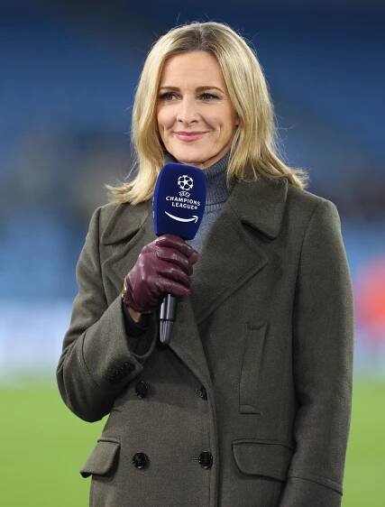 Gabby Logan holding a Champions League microphone.