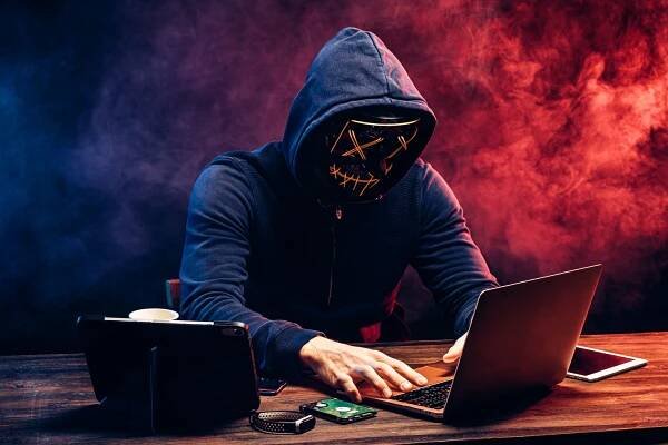 "Hacker: Leveraging Technology for Unlawful Gain"