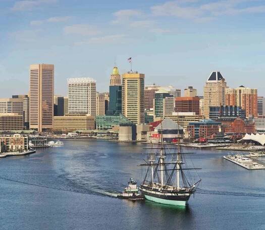 Baltimore Skyline with USS Constellation