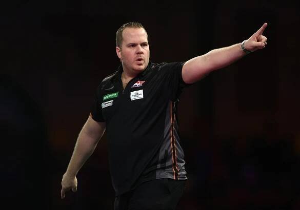 Dirk van Duijvenbode of the Netherlands reacting during a darts match.