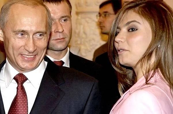 FOTO: Ruská gymnastka Alina Kabajevová s ruským prezidentem Vladimirem Putinem. – stránka 16
