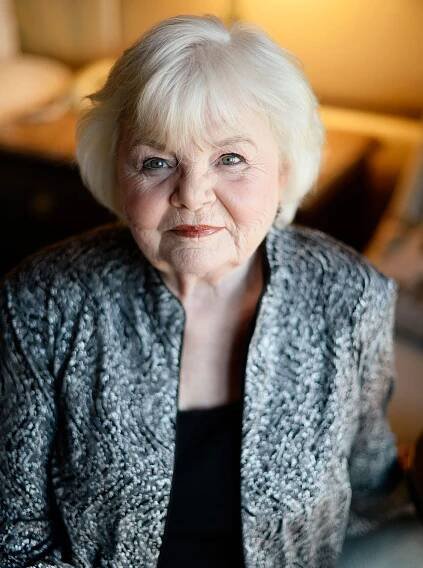 Image may contain June Squibb Adult Person Face Head Photography Portrait Happy Smile Blonde and Hair