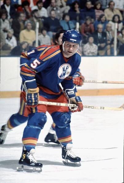BUFFALO, NEW YORK - CIRCA 1970: Gary Bergman #5 of the Kansas CIty Scouts skates against the Buffalo Sabres circa 1970 at the Buffalo Memorial Auditorium in Buffalo, New York. (Photo by Robert Shaver/Bruce Bennett Collection/Bruce Bennett Studios via Getty Images )