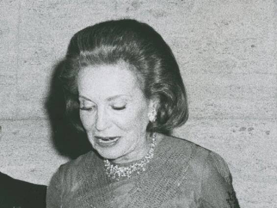 Adele Astaire wearing dress is looking down and talking  - 1973