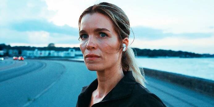 Marie Bach Hansen As Cecilie with headphones in Secrets We Keep