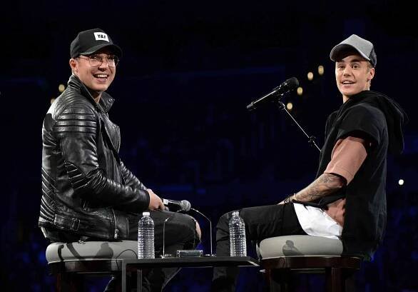 Justin Bieber and pastor Judah Smith speak onstage during an evening with Justin Bieber to celebrate the release of his new album "Purpose" at Staples Center on November 13, 2015 in Los Angeles, California. 