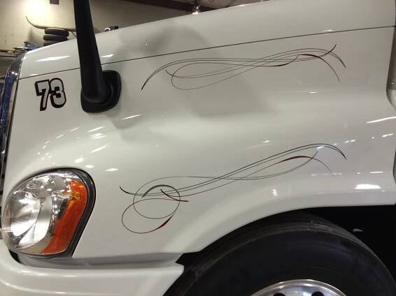 Free hand pinstriping - McIntyre Signs