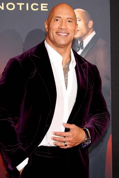 Dwayne Johnson Jokes He 'Will Forever Be Sexiest Man Alive' at Red Notice Premiere