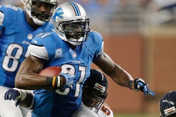 Lions wide receiver Calvin Johnson getting yards after the catch against the Bears.