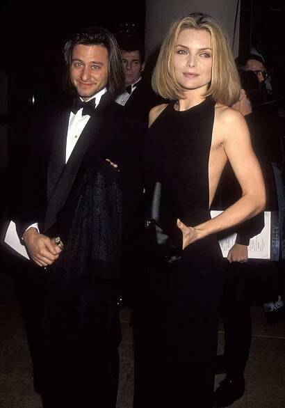 Michelle Pfeiffer and Fisher Stevens on the red carpet in formalwear and matching bobs